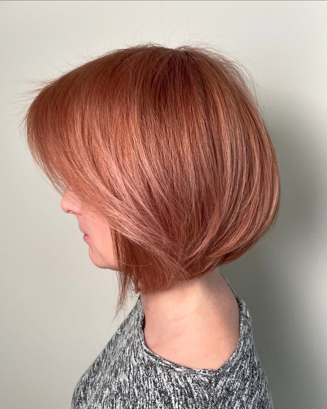summer bob haircut 2026 Warm Copper Layered Bob with Soft Lift