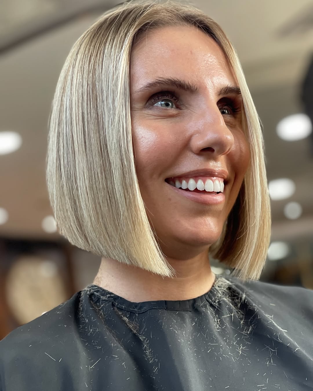 summer bob haircut 2026 Glossy Blonde Precision Bob with Clean Ends