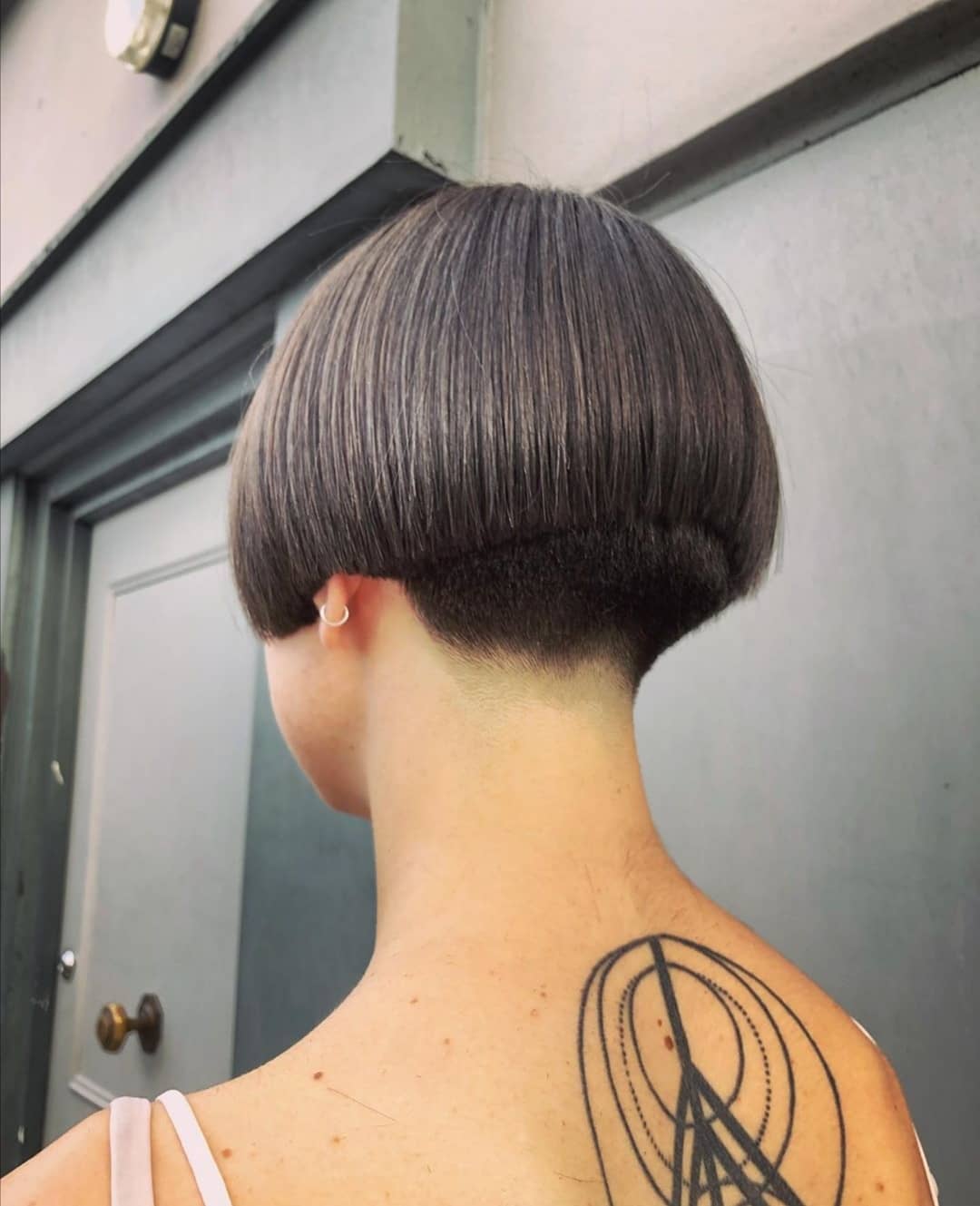 summer bob haircut 2026 Undercut Bowl Bob with Graphic Precision