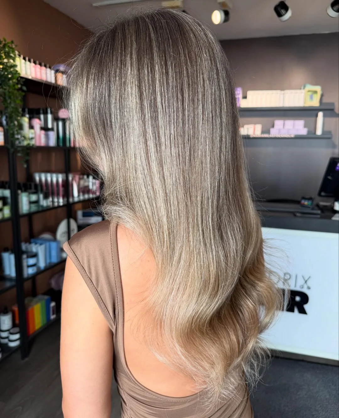 chic summer haircuts for thin fine hair 2026 Smooth Straight Layers with Feathered Ends