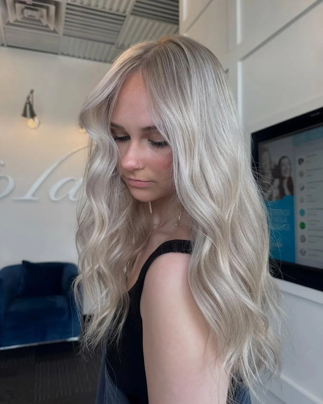 chic summer haircuts for thin fine hair 2026 Soft Blonde Layers with Airy Curtain Bangs