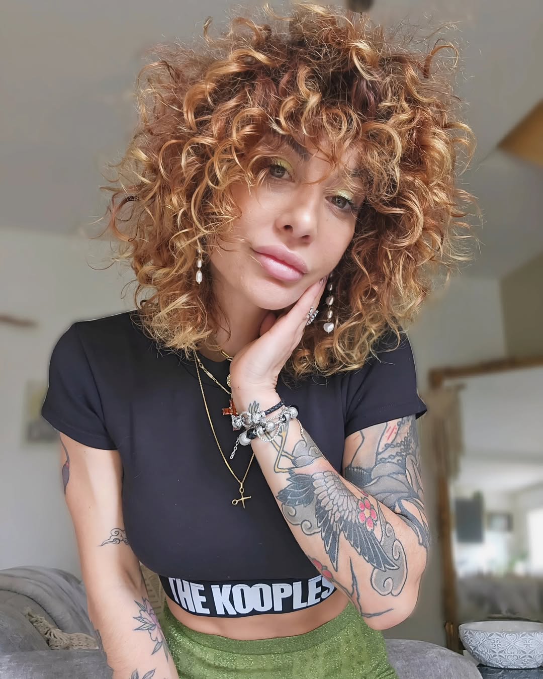 chic summer shag haircut 2026 curly shag haircut with bangs