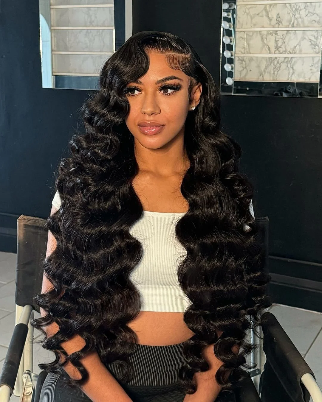 cute summer hairstyle black women 2026 Defined Glam Waves with Sculpted Edges
