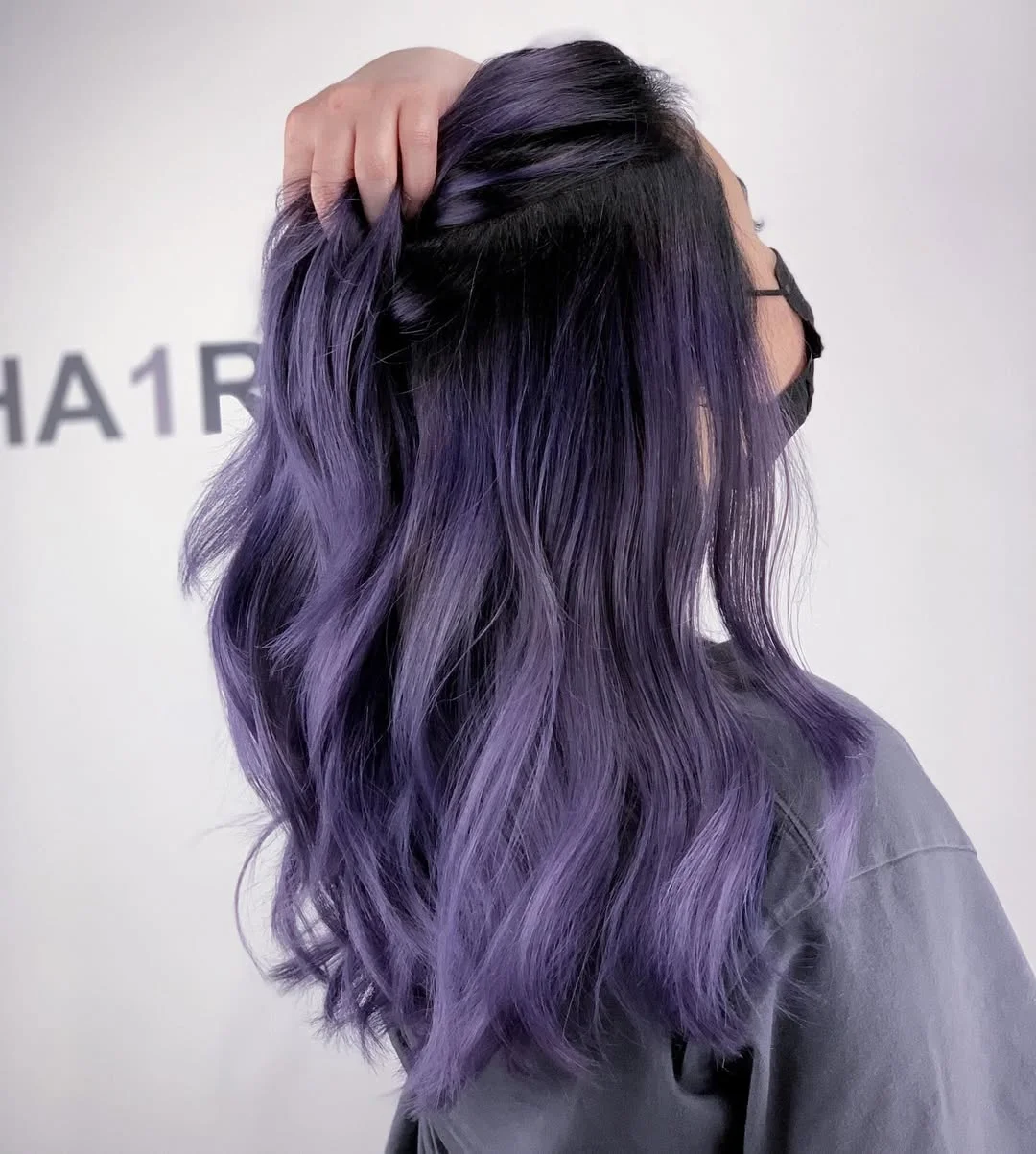 dimensional summer ombre hair color 2026 Deep violet ombre with glossy dimension