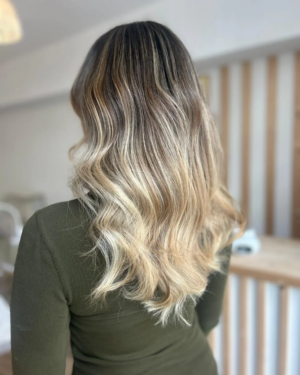 dimensional summer ombre hair color 2026 Soft caramel blonde ombre with airy movement