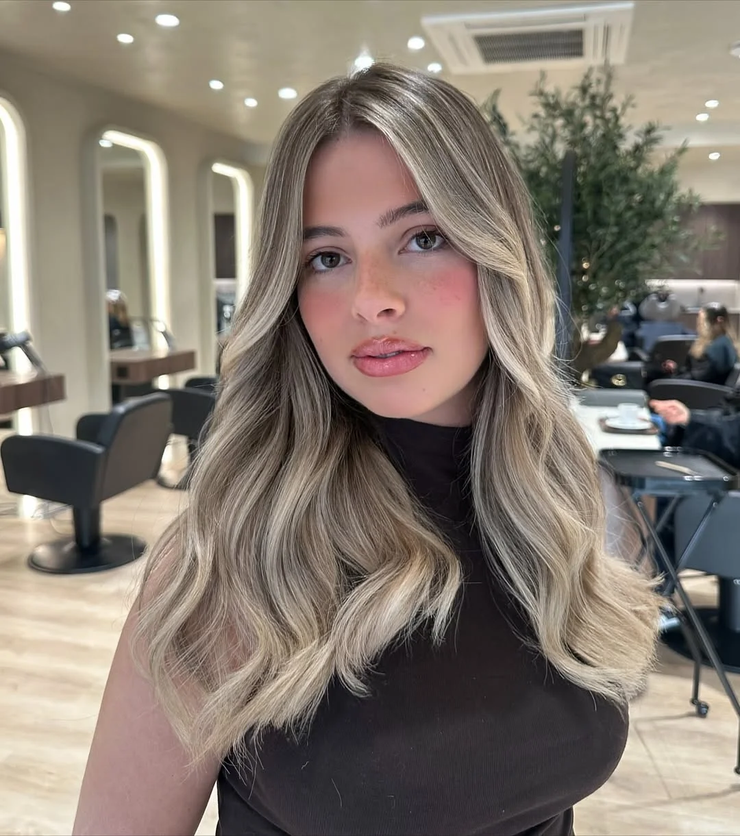 dimensional summer ombre hair color 2026 Neutral beige blonde ombre with soft face framing