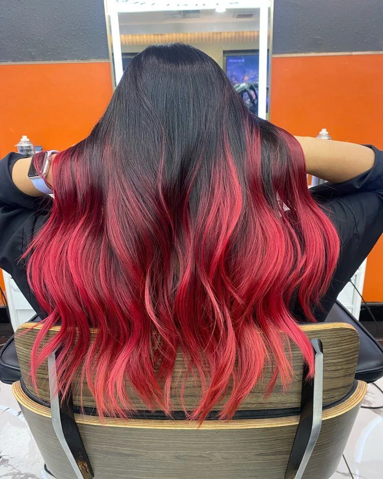 dimensional summer ombre hair color 2026 Bold black to red ombre with high contrast finish