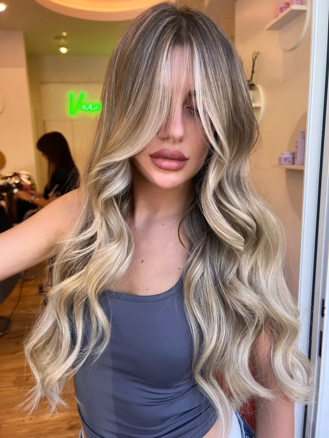 feathered summer haircuts for long hair 2026 Soft Butterfly Layers with Airy Curtain Movement