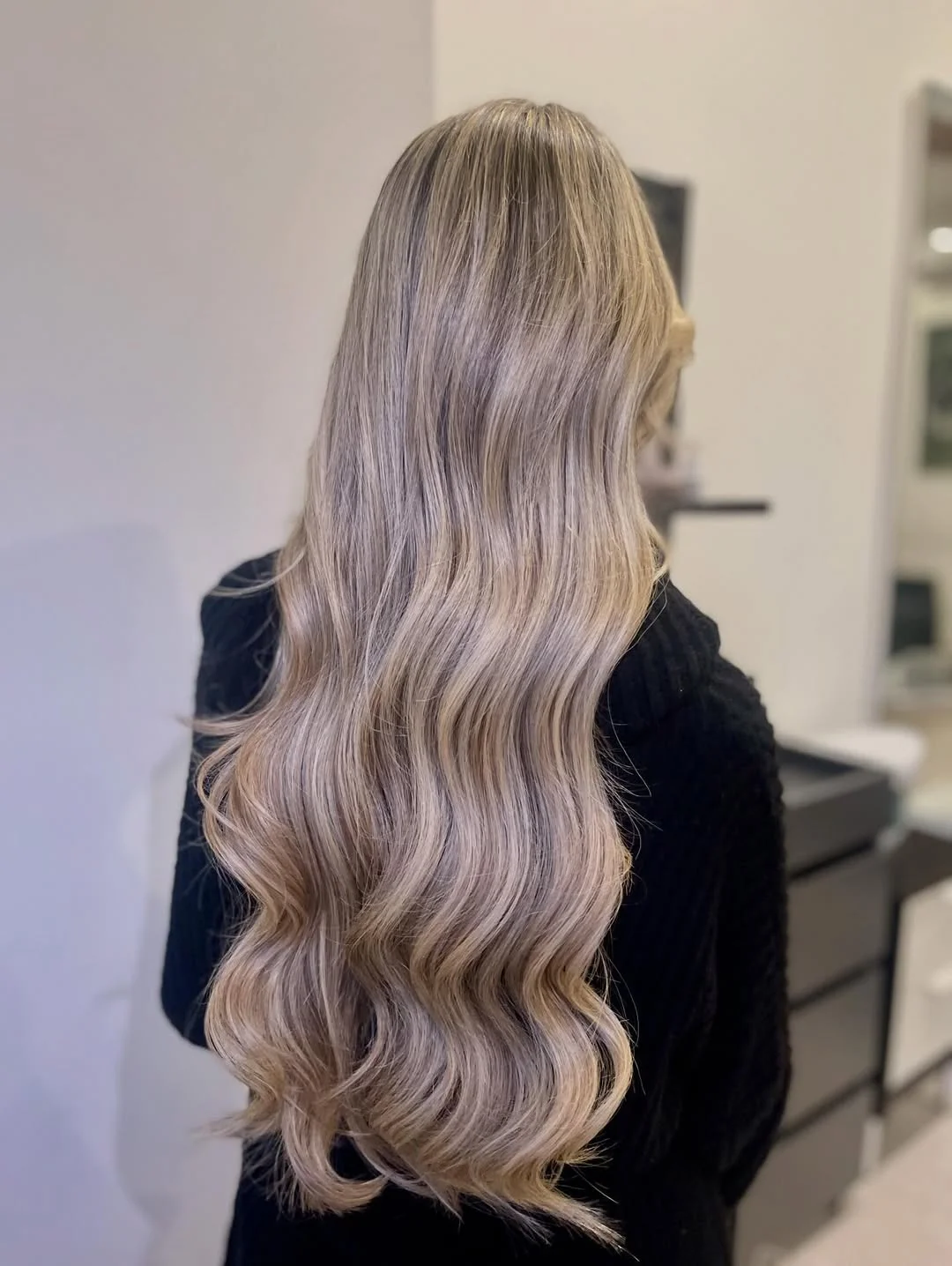 feathered summer haircuts for long hair 2026 Soft Beige Waves with Blended Feathered Layers