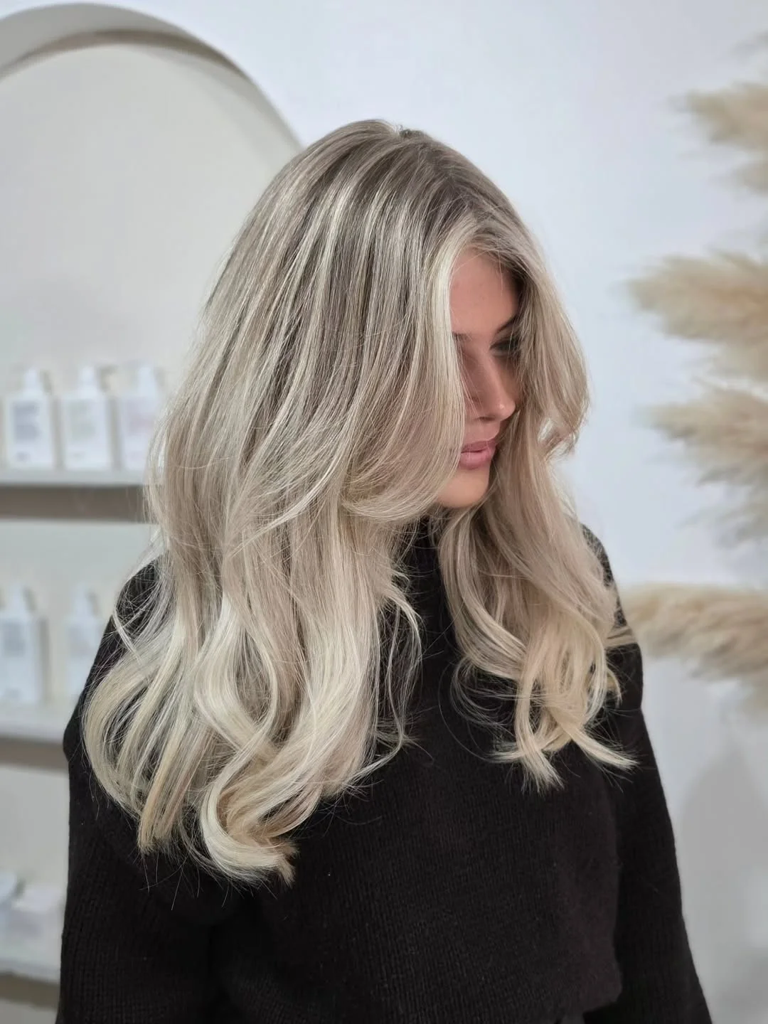 feathered summer haircuts for long hair 2026 Bright Blonde Face-Framing Layers with Soft Curtain Bangs