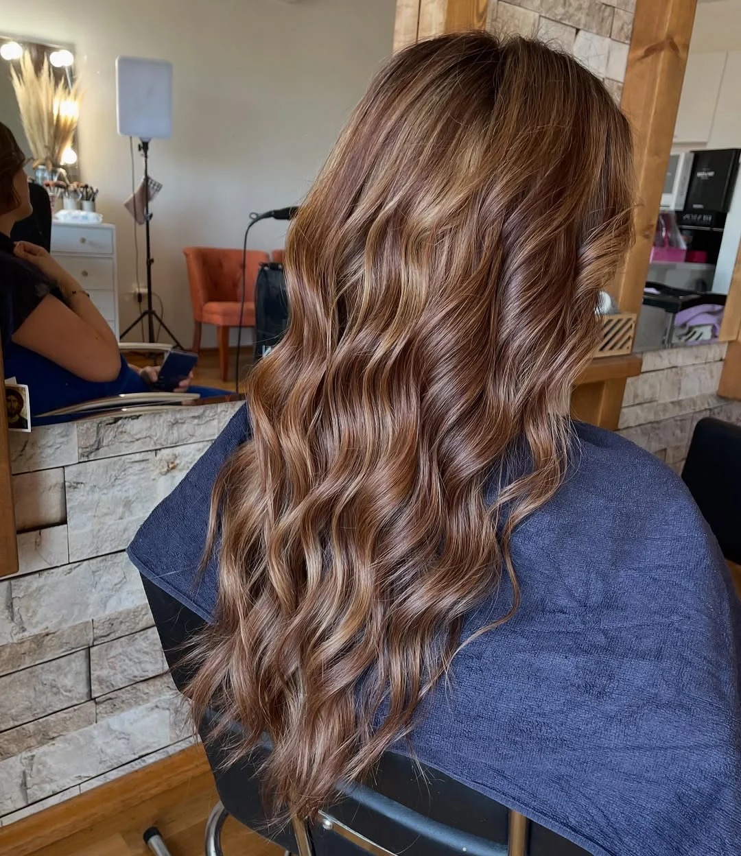 feathered summer haircuts for long hair 2026 Soft Caramel Waves with Seamless Feathering