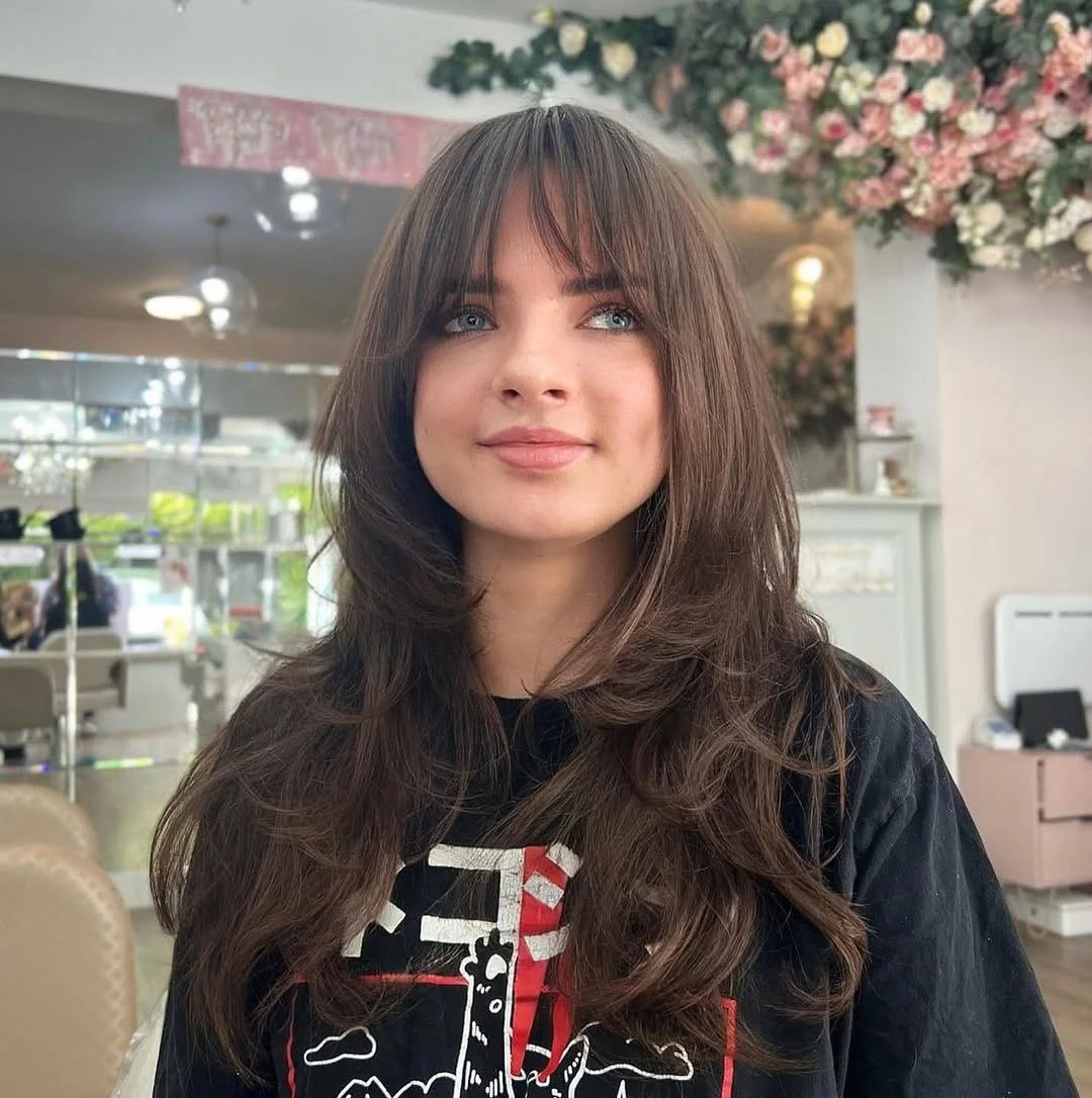 flattering summer hairstyles ideas 2026 Layered Curtain Fringe with Soft Volume Waves