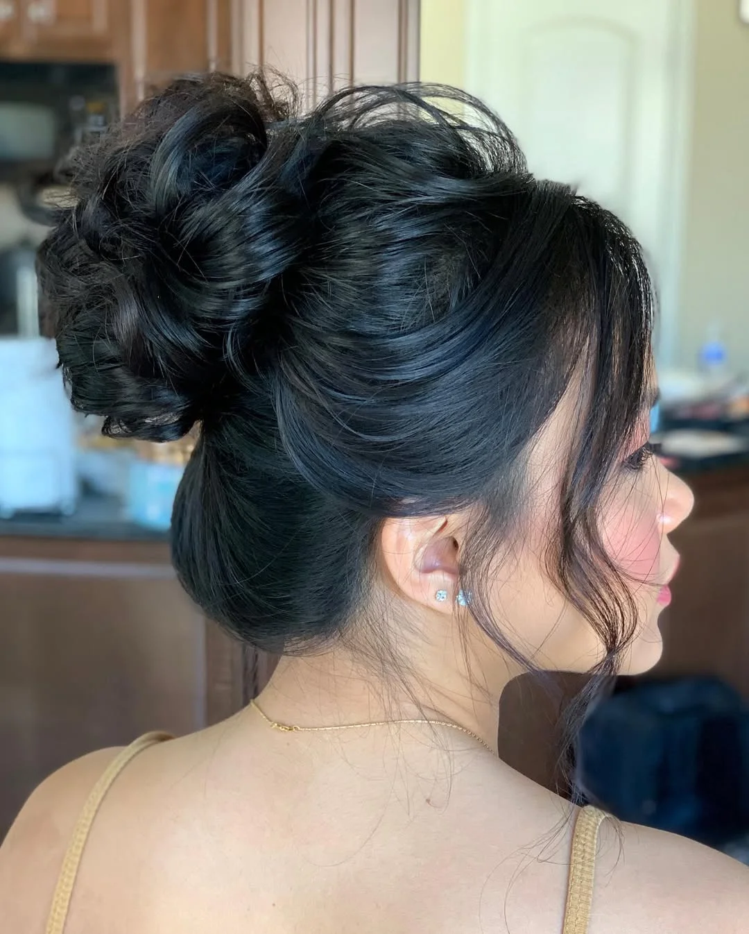 flattering summer hairstyles ideas 2026 Elegant Textured Updo with Soft Face-Framing Strands