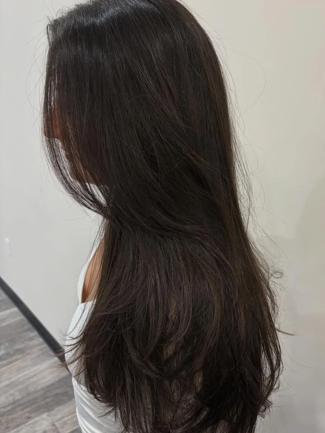 gorgeous summer haircut for round face 2026 Natural Flowing Long Layers with Barely There Waves