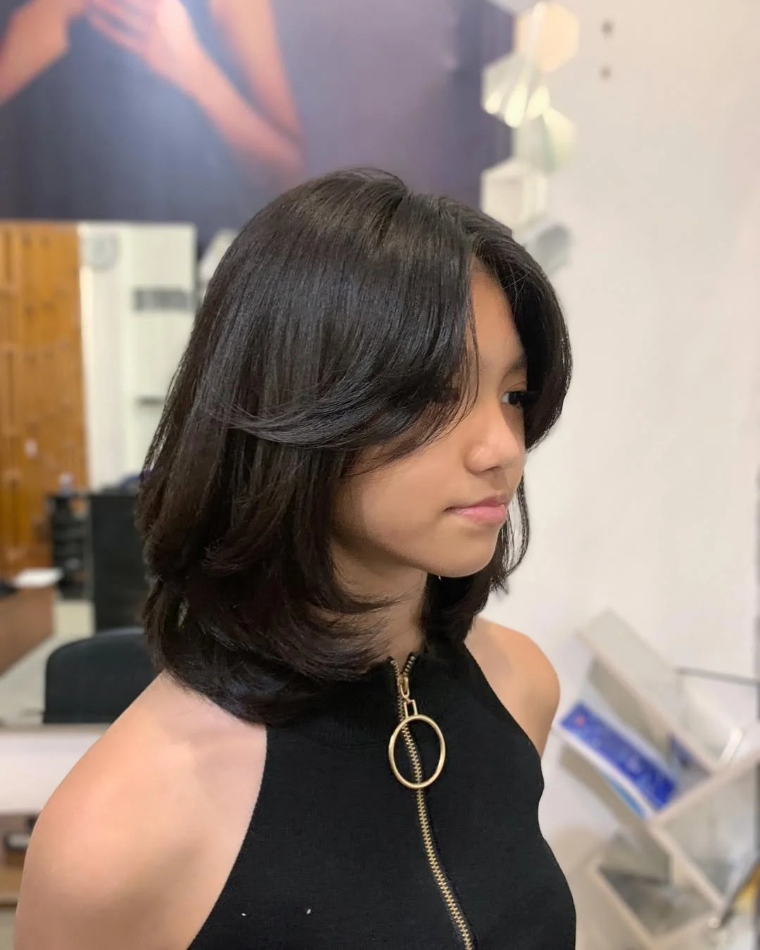 gorgeous summer haircut for round face 2026 Soft Layered Mid Length with Polished Flip Ends