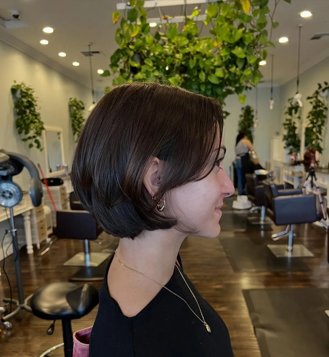 gorgeous summer haircut for round face 2026 Polished Short Bob with Tucked Ends