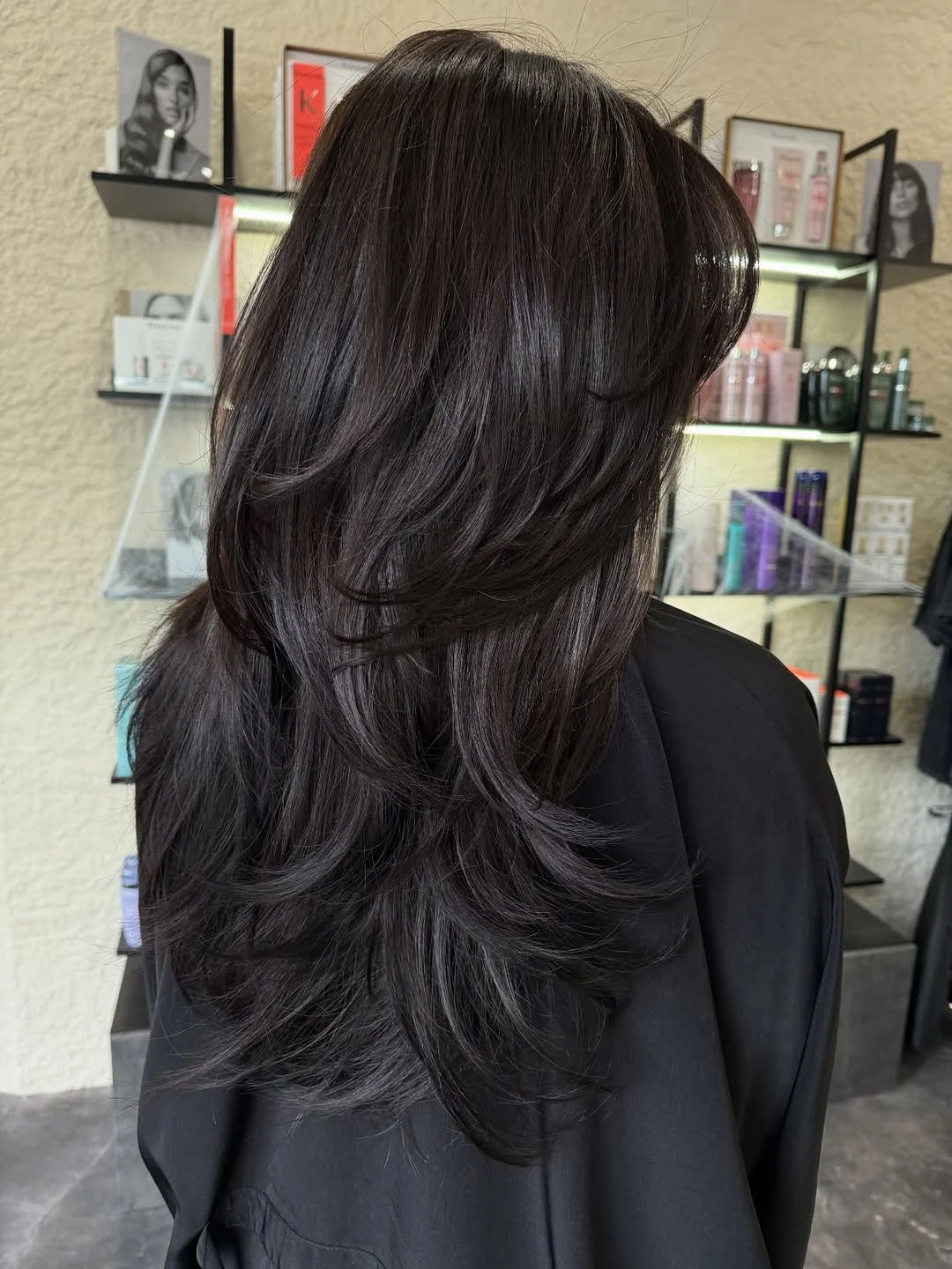 gorgeous summer haircut for round face 2026 Layered Brunette Cascade with Soft Shag Energy