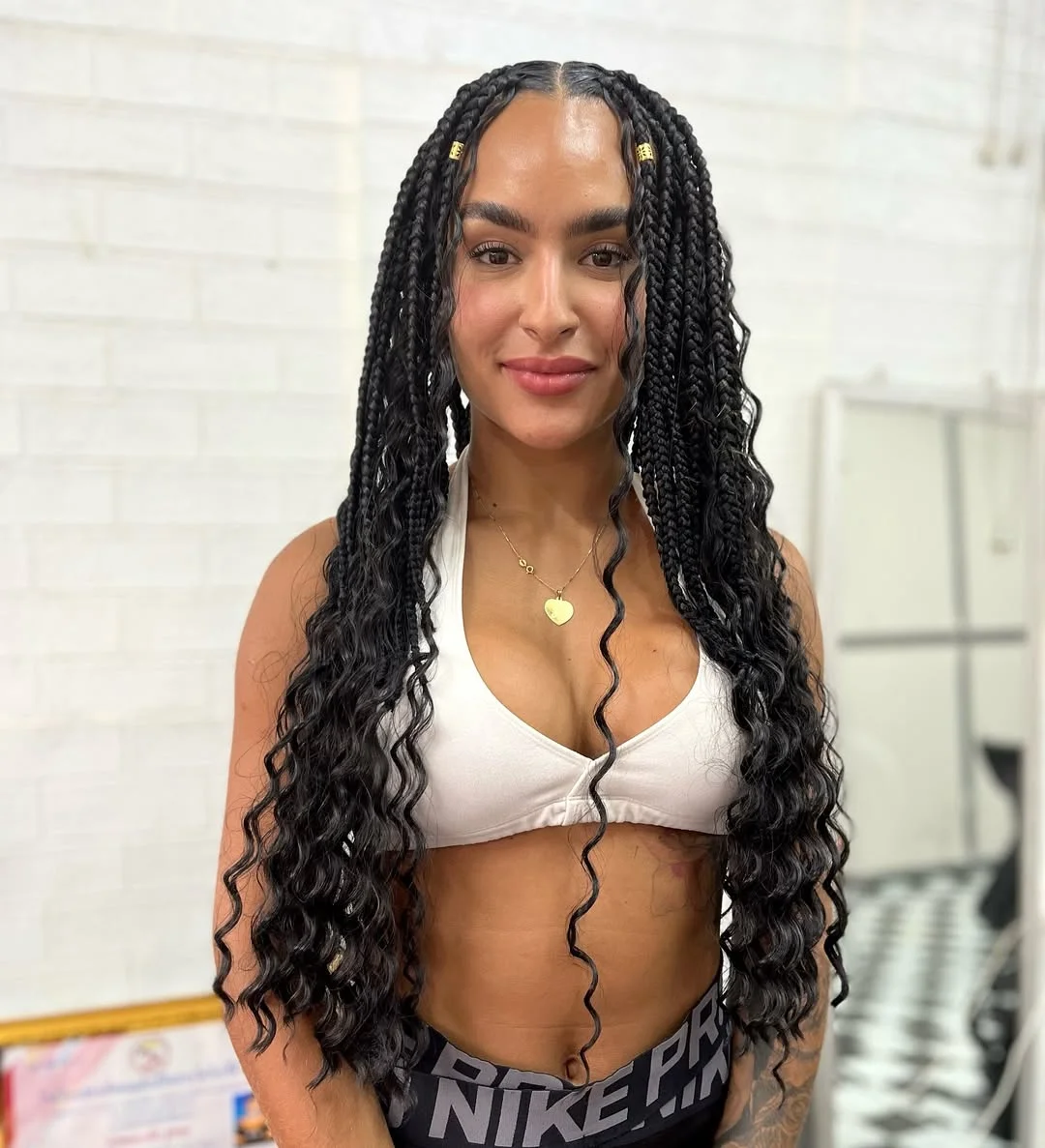 sassy summer short hairstyles 2026 Boho Braids with Loose Curly Ends