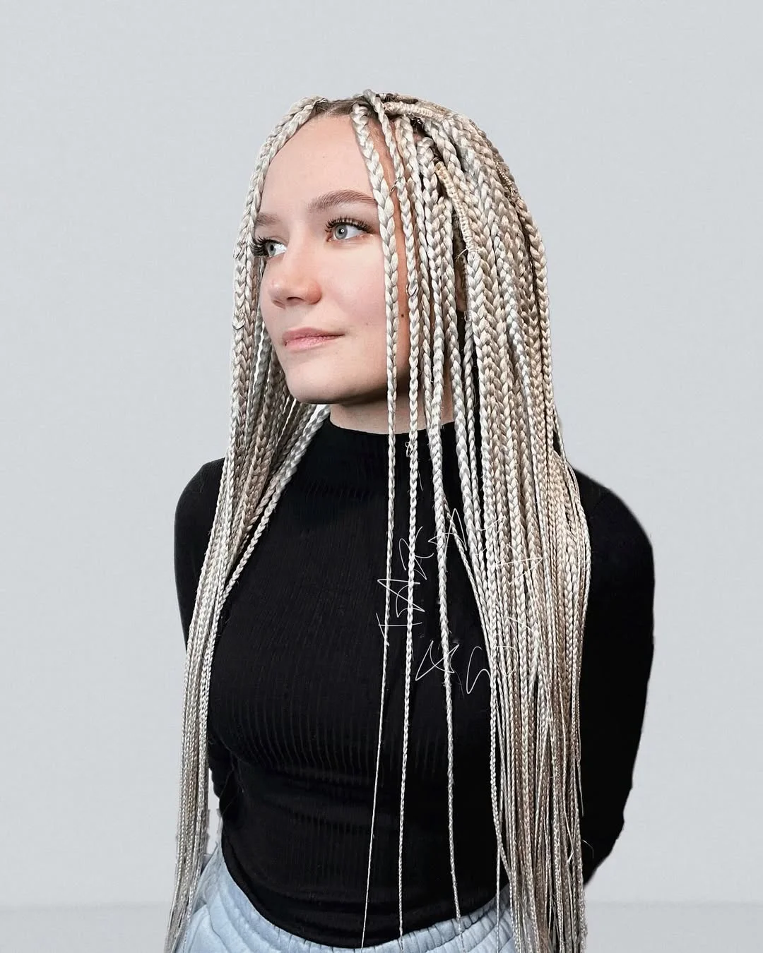 sassy summer short hairstyles 2026 Platinum Micro Braids with Sleek Length