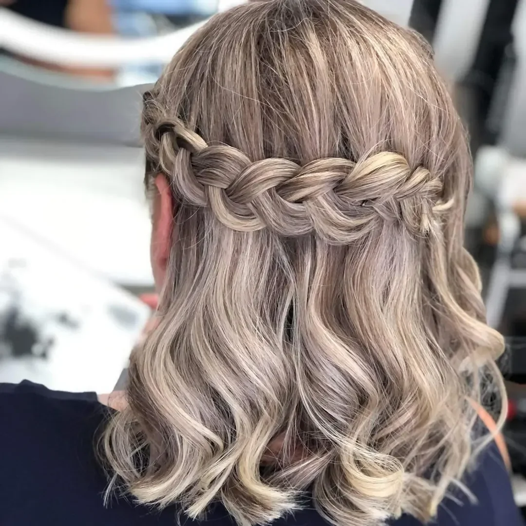 sassy summer short hairstyles 2026 Soft Wavy Bob with Braided Halo Detail