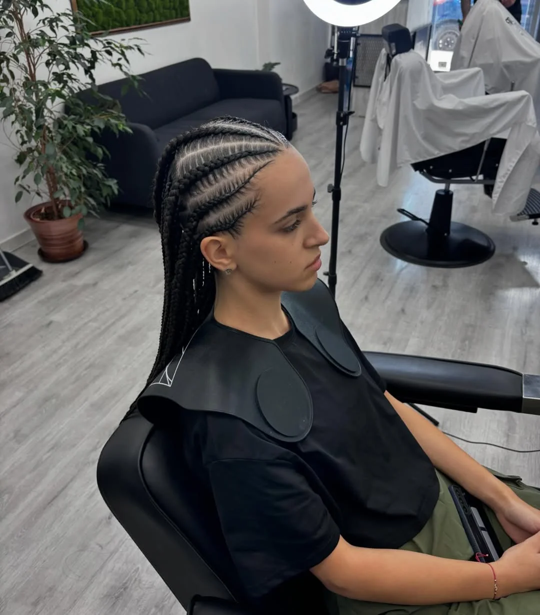sassy summer short hairstyles 2026 Sleek Cornrows with Extended Length Finish