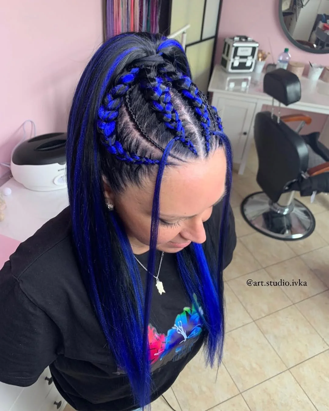 sassy summer short hairstyles 2026 High Ponytail with Electric Blue Braided Accents