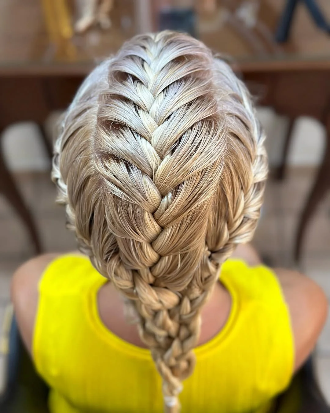 sassy summer short hairstyles 2026 Soft Blonde Crown Braid with Romantic Texture