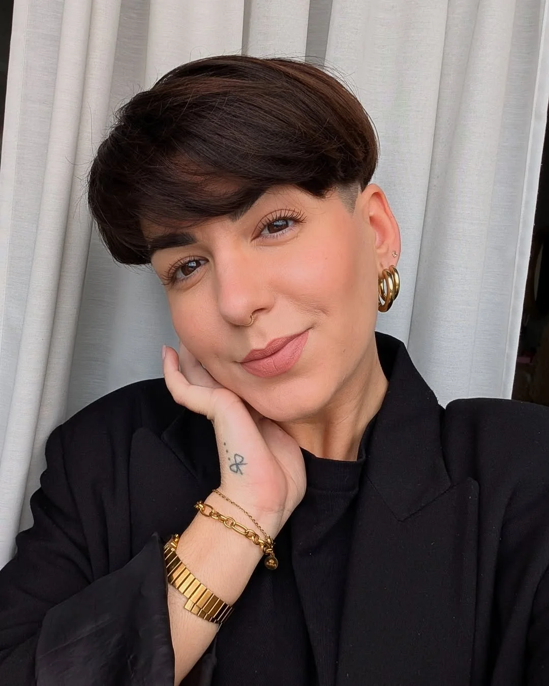 sassy summer short hairstyles 2026 Polished Brunette Pixie with Side-Swept Volume