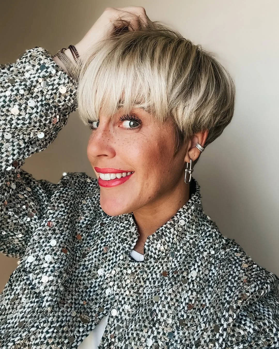 sassy summer short hairstyles 2026 Platinum Pixie with Full Fringe Drama