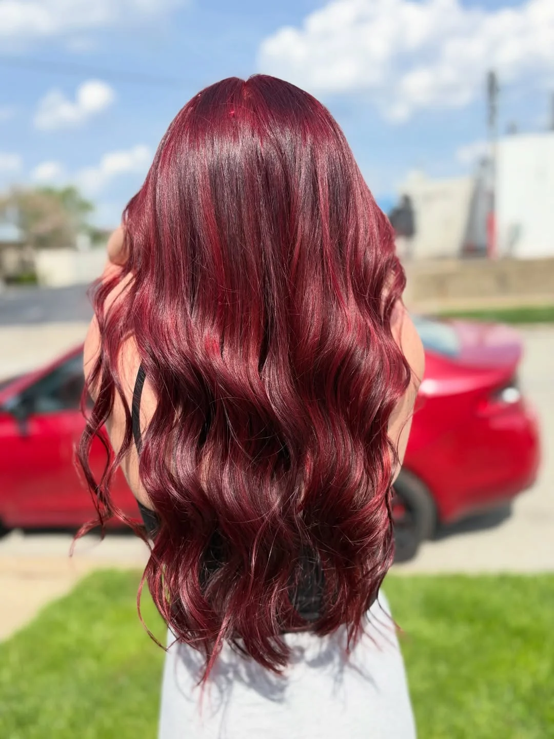 soft summer red hair color 2026 Soft Garnet Waves with Sunlit Dimension