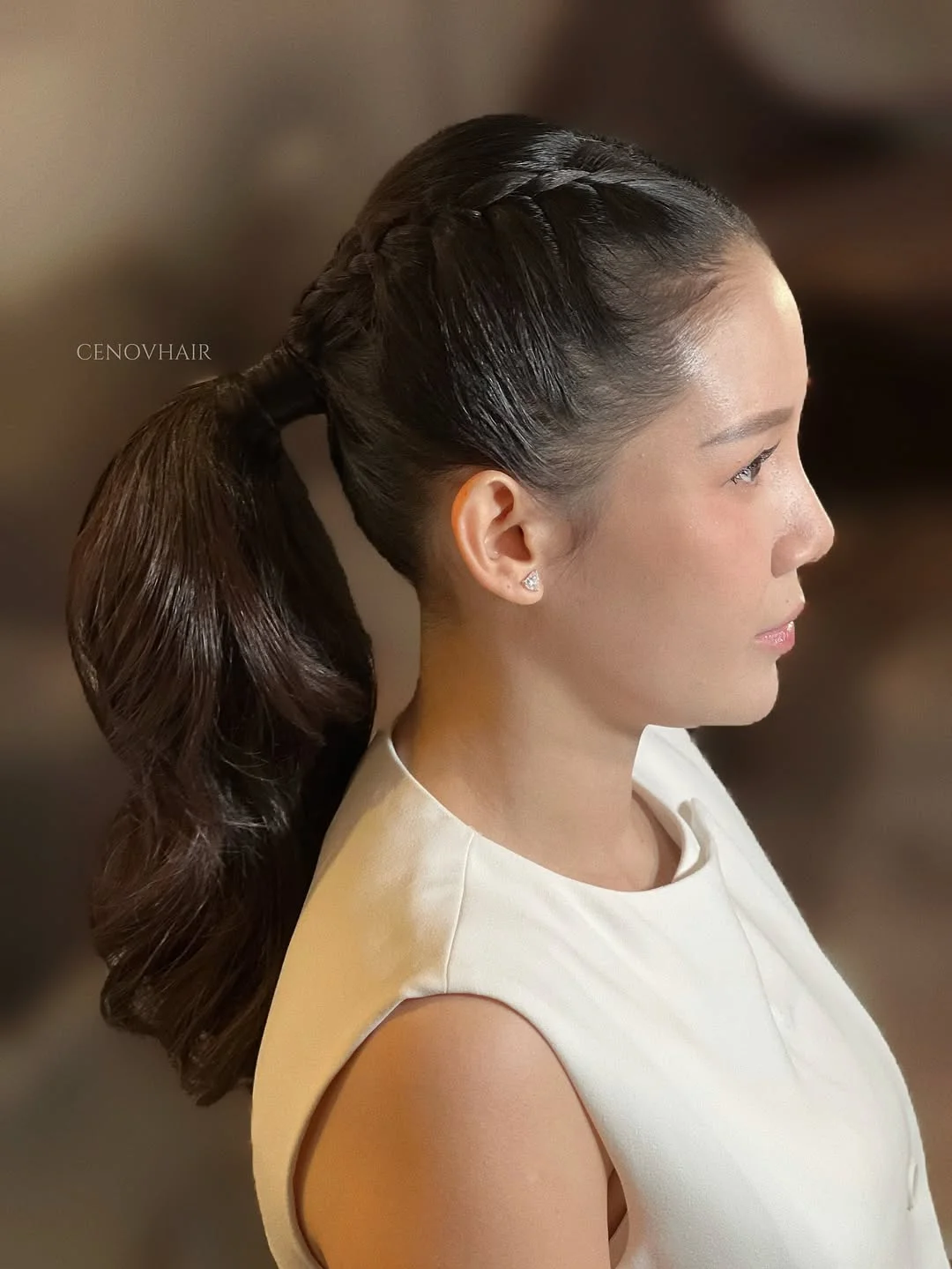 sporty summer ponytail hairstyle 2026 Sporty Ponytail with Braided Crown Detail