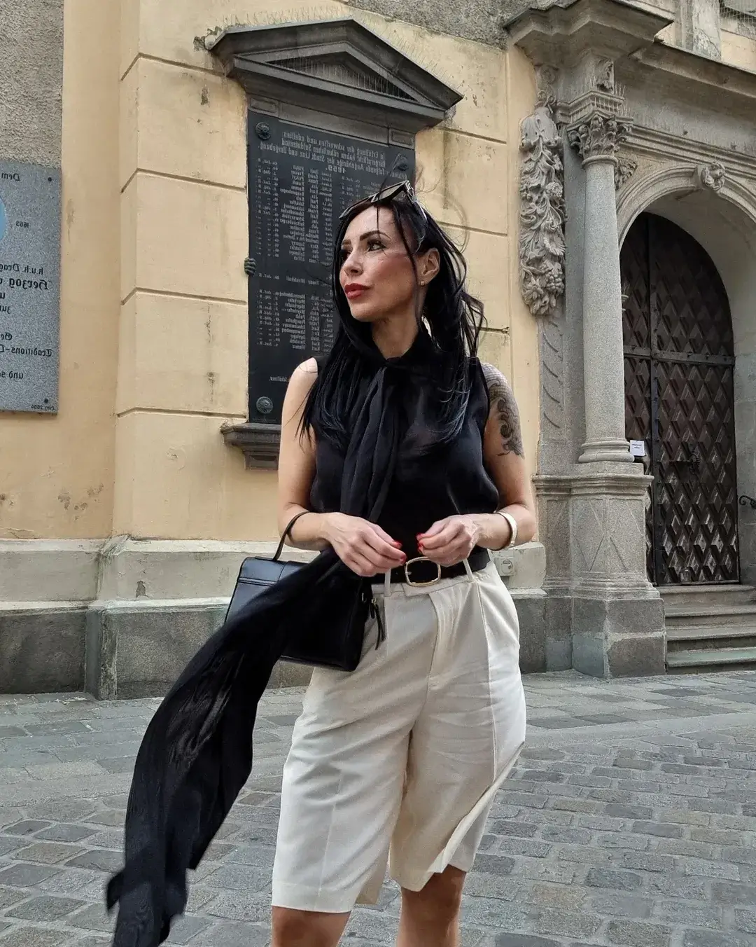 summer business casual outfit 2026 Effortless Contrast with Sleeveless Black and Tailored Shorts