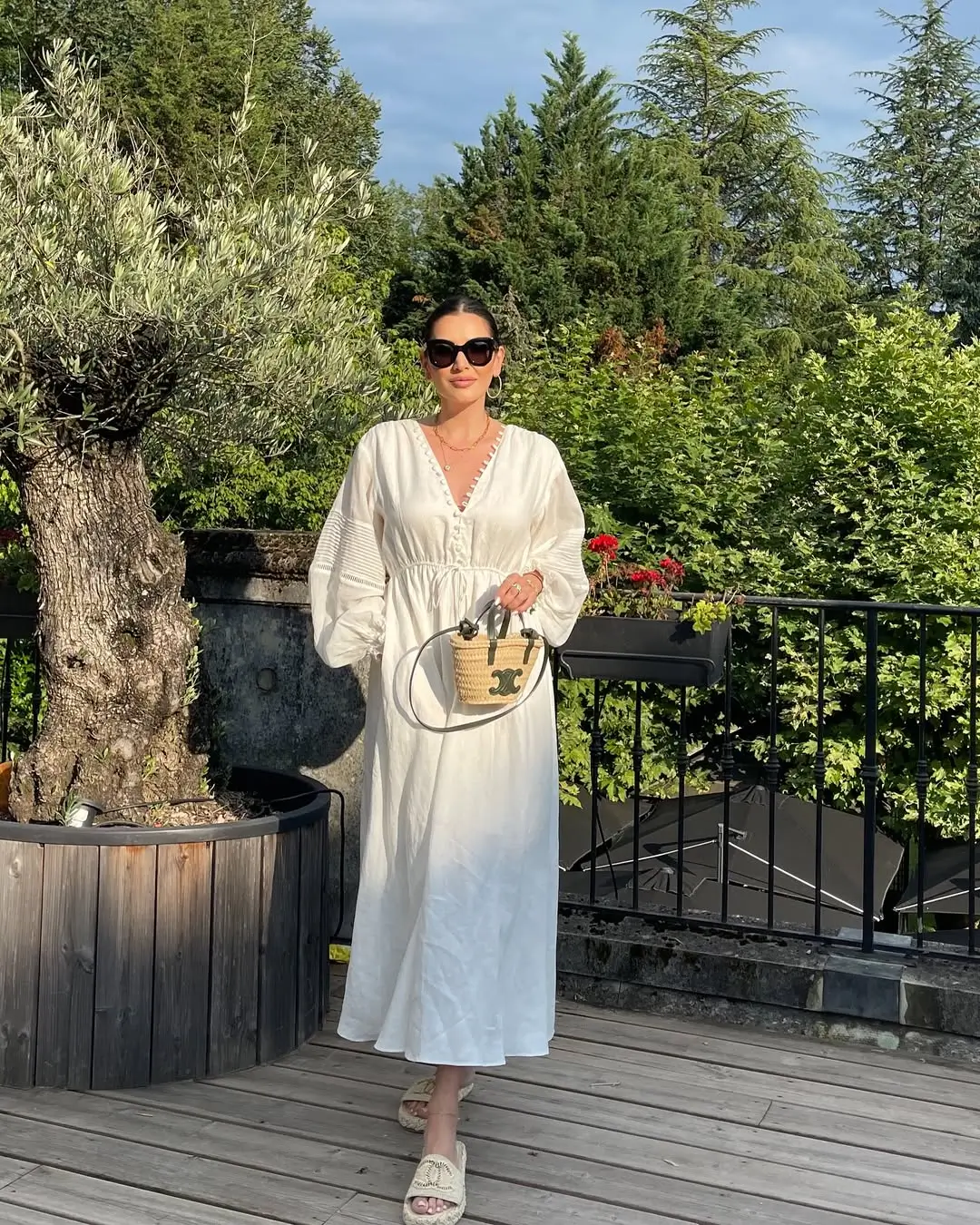 summer linen outfits 2026 Flowing White Linen Dress & That Timeless European Glow