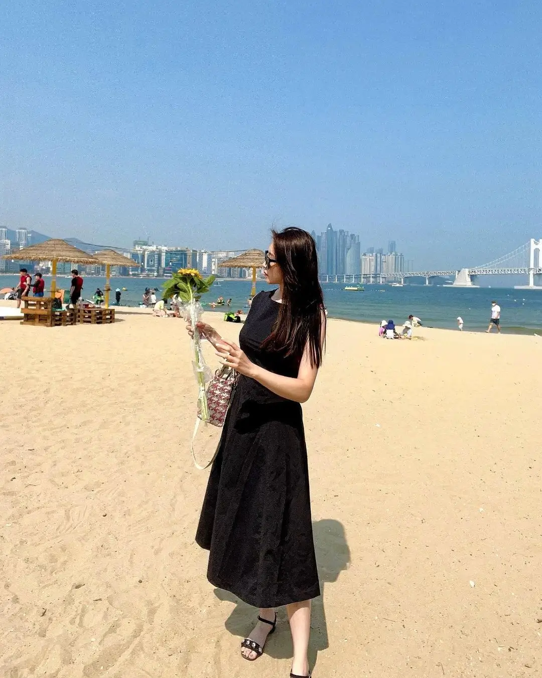 summer sleeveless dresses 2026 Black Midi on the Sand Quiet Drama Always