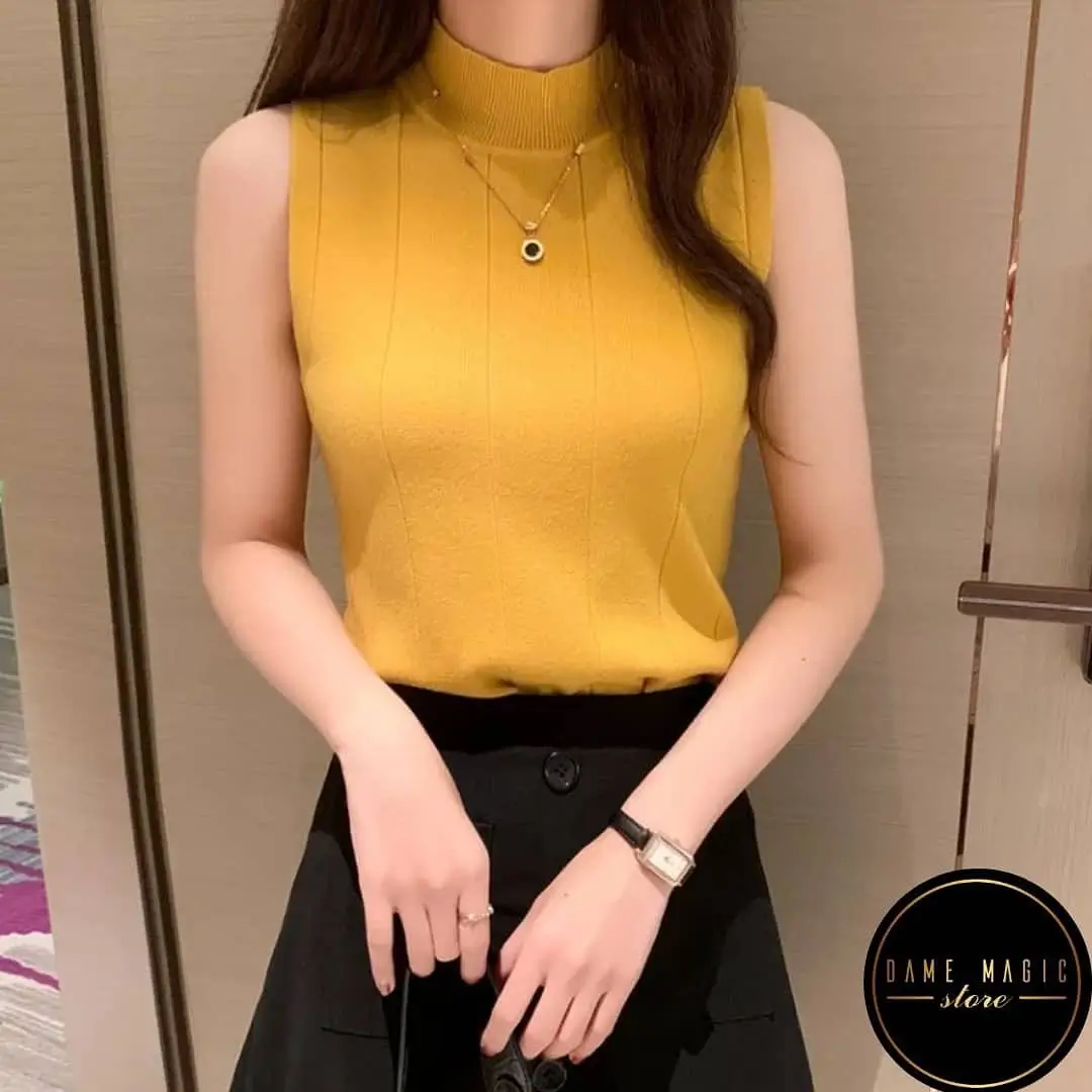 summer sleeveless tops 2026 Golden Minimalism: When a Simple Top Feels Like Jewelry