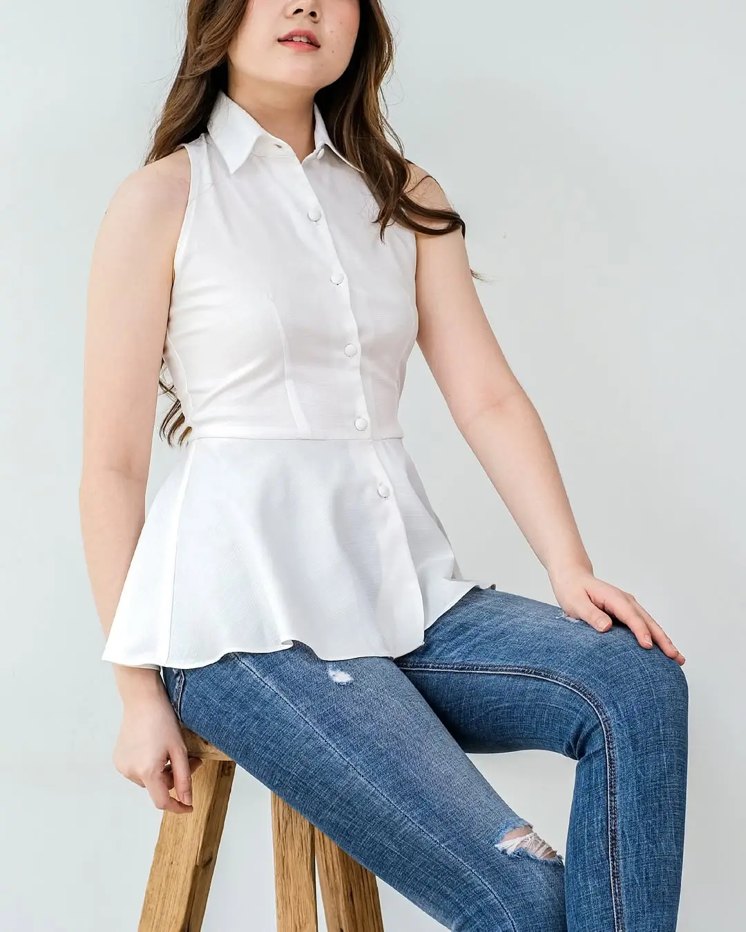 summer sleeveless tops 2026 Modern White Peplum: Soft Structure That Moves With You