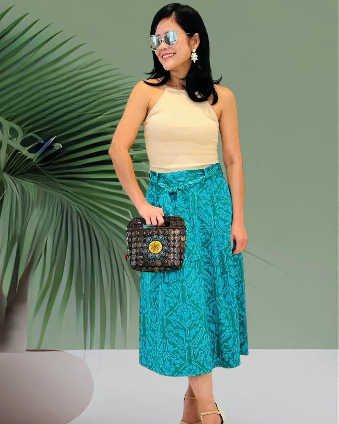 summer tops outfit 2026 The Beige Halter and Green Skirt That Feels Fresh and Collected