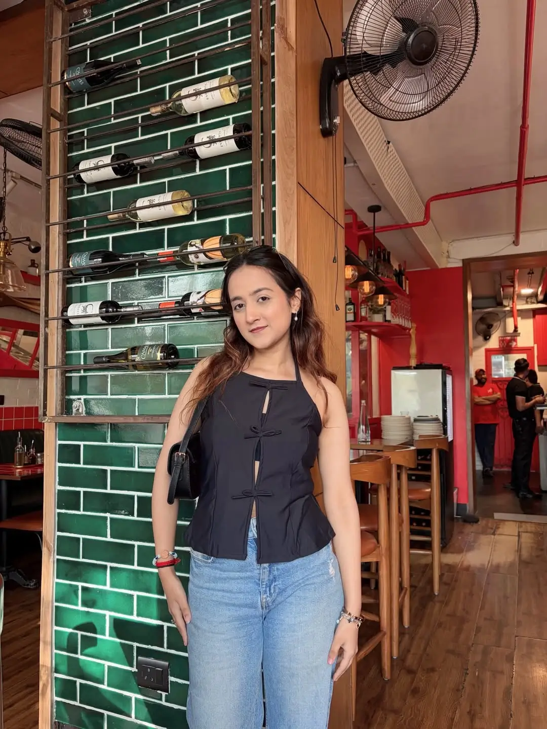 summer tops outfit 2026 The Black Halter Top That Makes Denim Feel Instantly Cooler