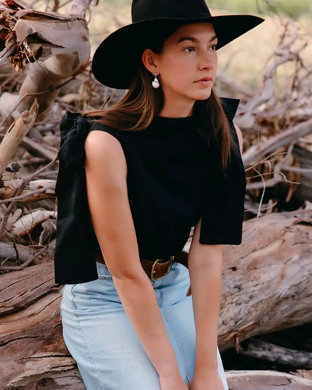 summer tops outfit 2026 The Structured Black Top That Feels a Little Bit Western