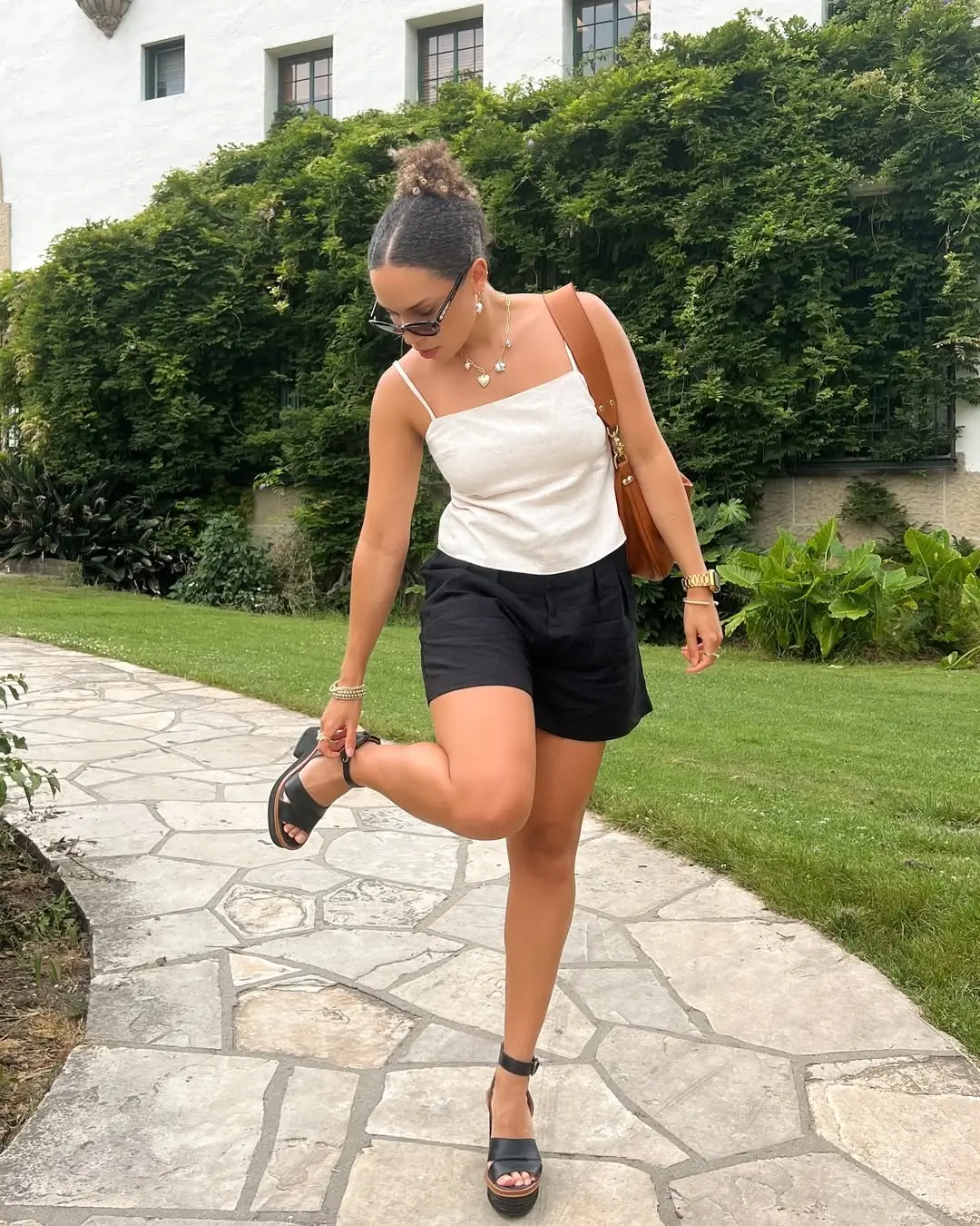 summer tops outfit 2026 The Crisp White Tank That Carries You Through Heatwaves