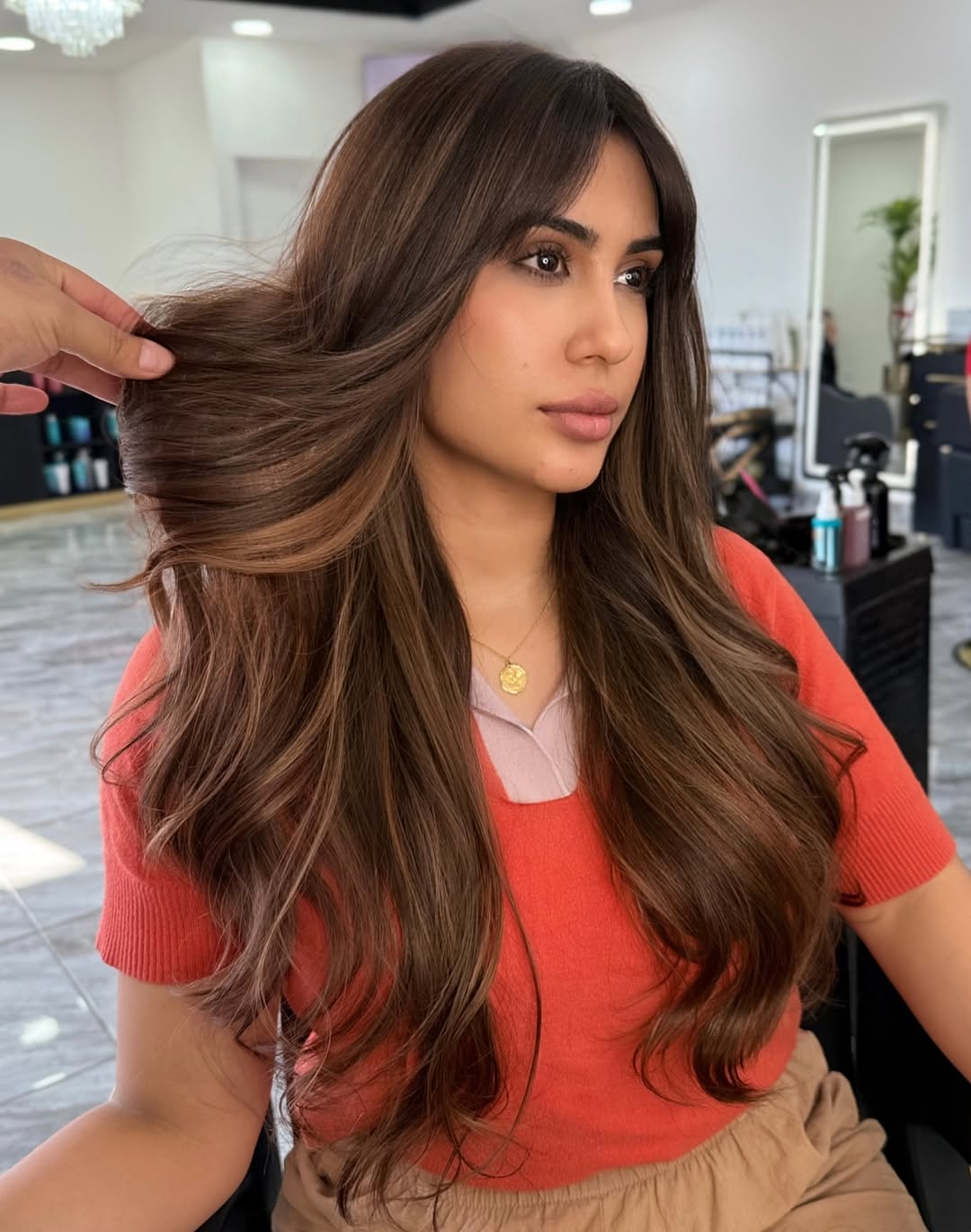 trendy summer hair color ideas for brunettes 2026 Warm Cinnamon Brunette with Feathered Summer Layers