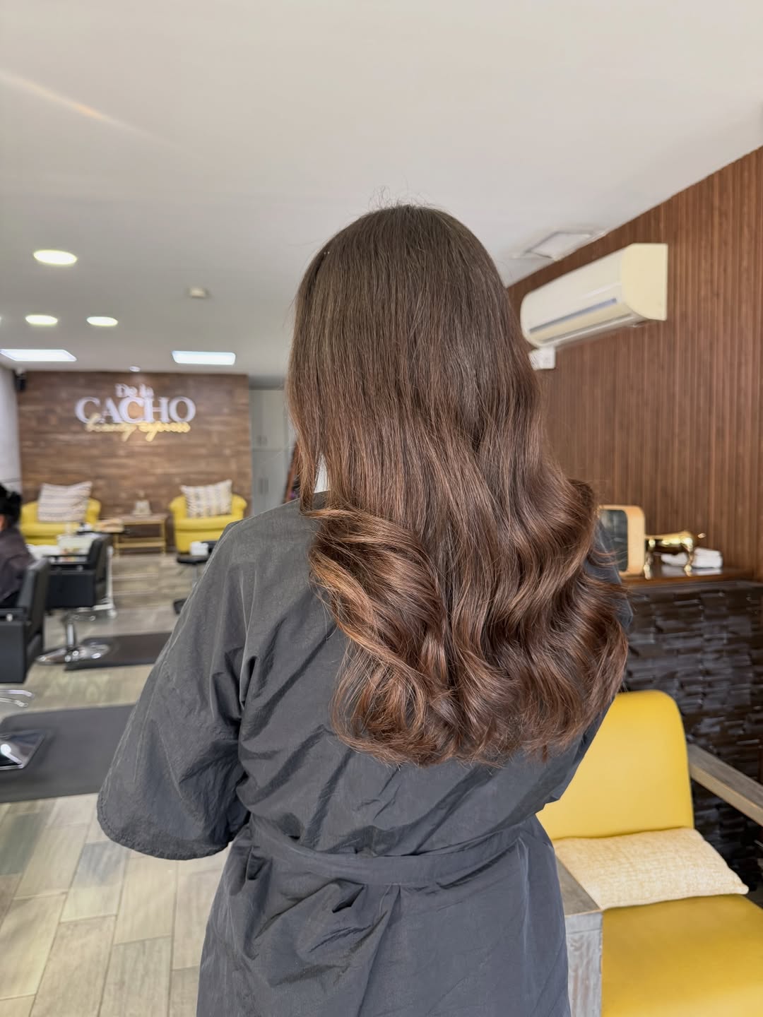 trendy summer hair color ideas for brunettes 2026 Glossy Cocoa Waves with Subtle Summer Lift