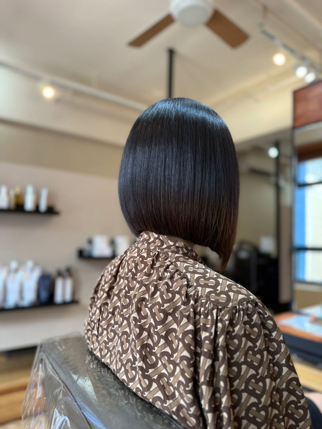 versatile summer haircut 2026 Glass Precision Bob with Mirror Shine