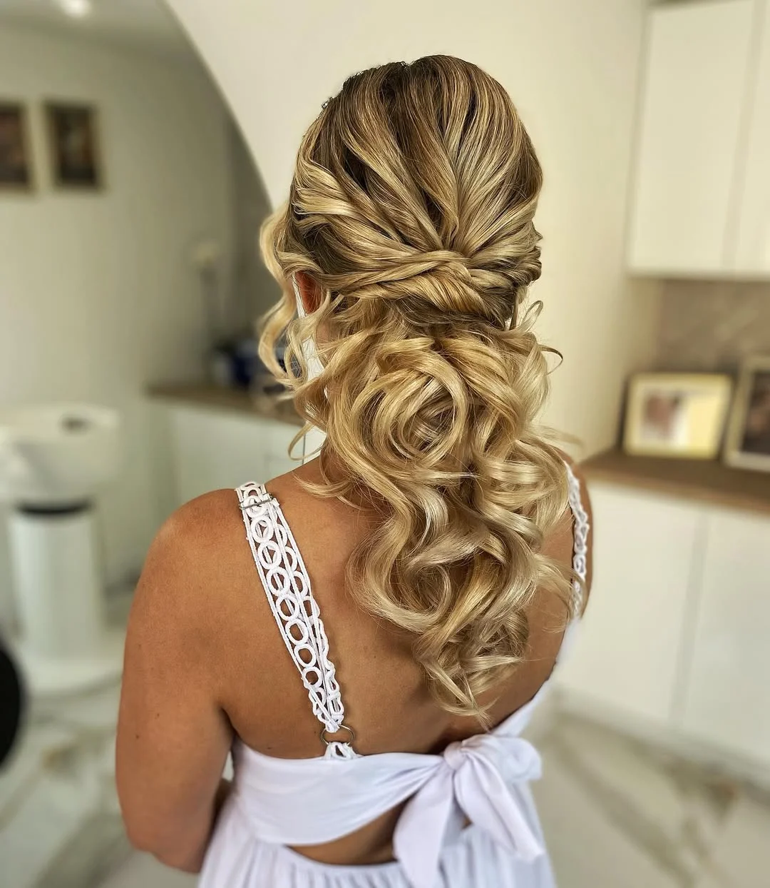 boho summer wavy hairstyle 2026 Golden Blonde Low Twist with Soft Defined Waves
