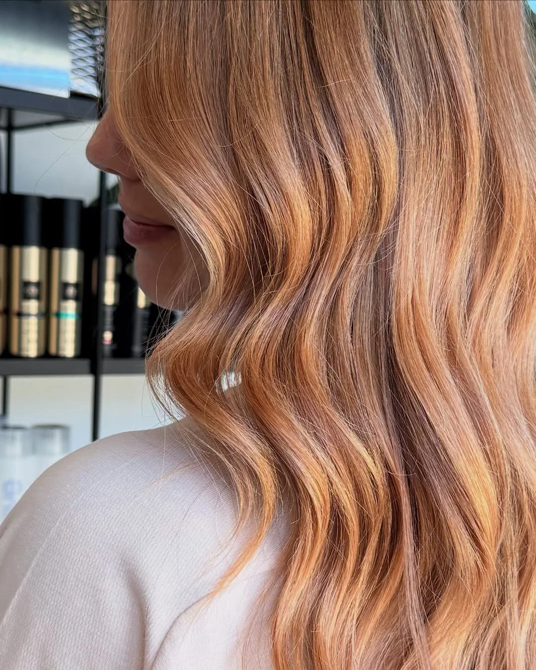 bright summer apricot blonde hair color 2026 Dimensional Apricot Ribbons with Warm Strawberry Depth