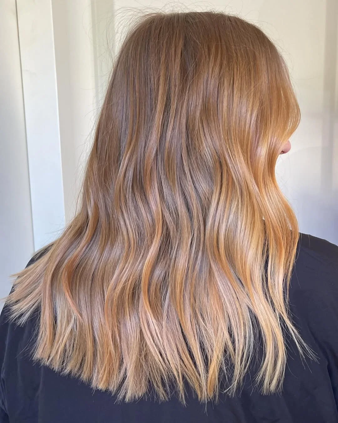 bright summer apricot blonde hair color 2026 Smoky Apricot Blonde with Natural Dark Root Depth