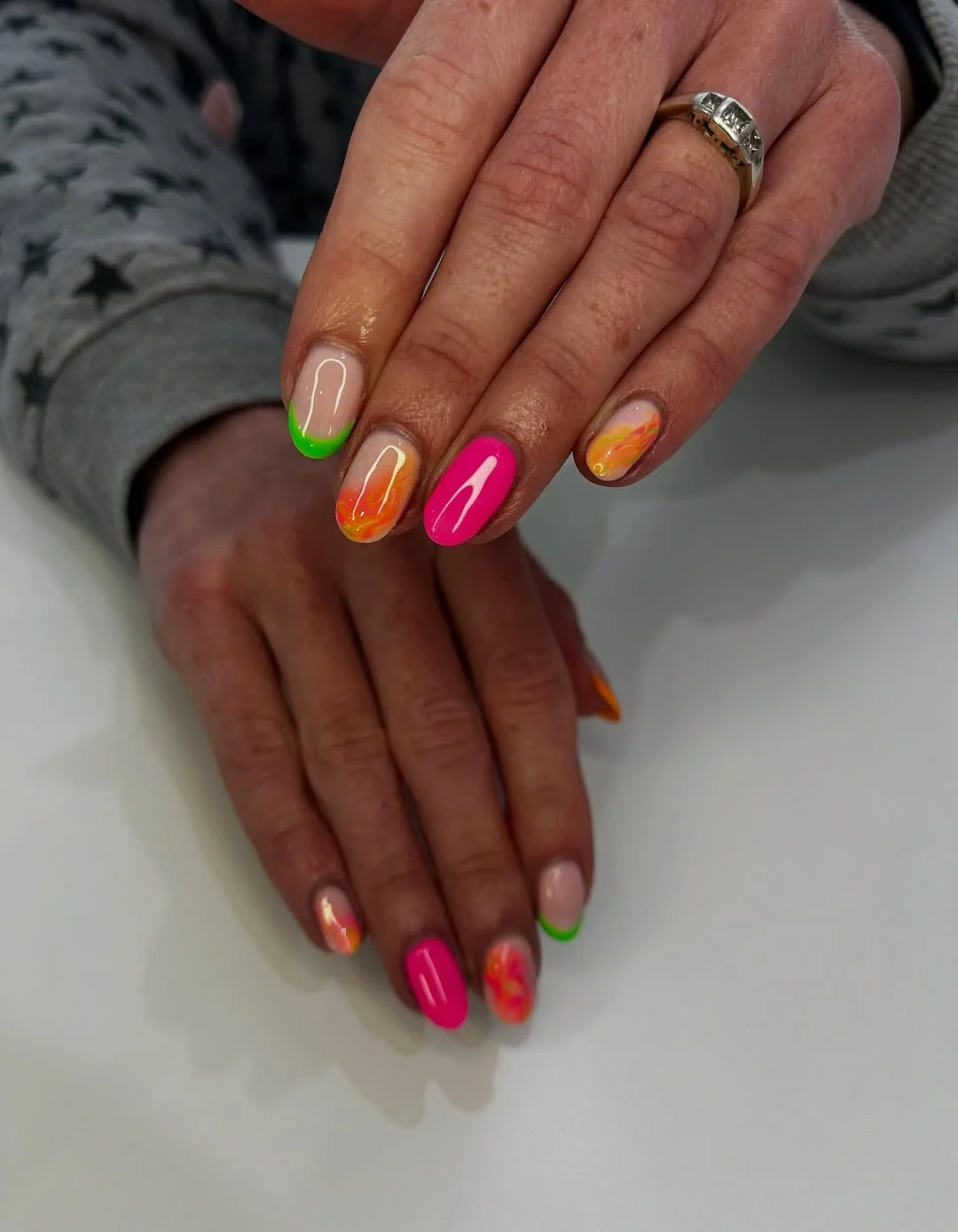 bright summer nails 2026 Tropical Sunset Swirls and Neon French Accents
