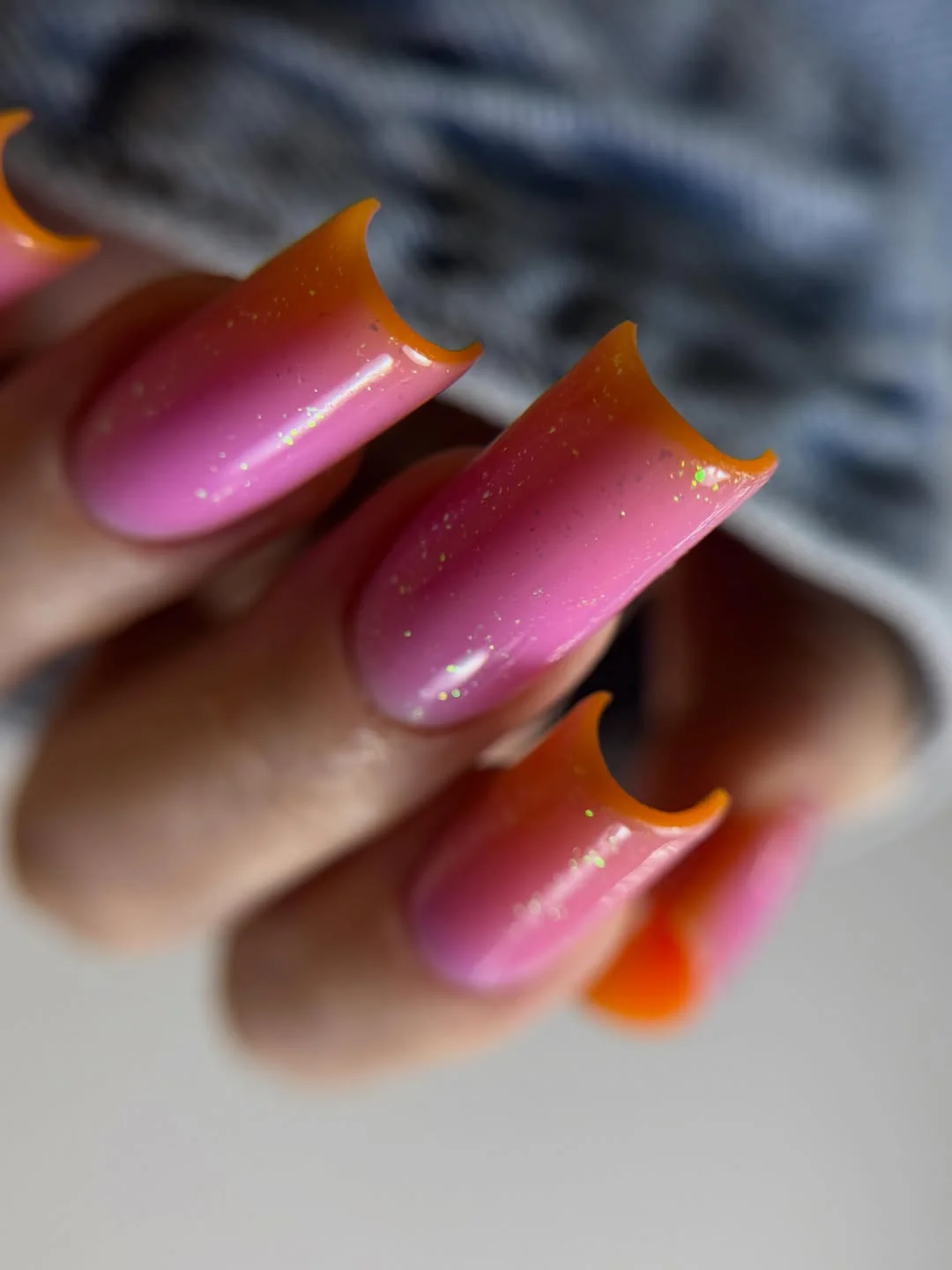 bright summer nails 2026 Pink Sorbet Aura Nails With Sunset Orange Tips