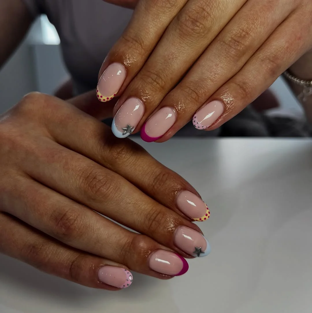 bright summer nails 2026 Playful French Tips With Tiny Summer Details