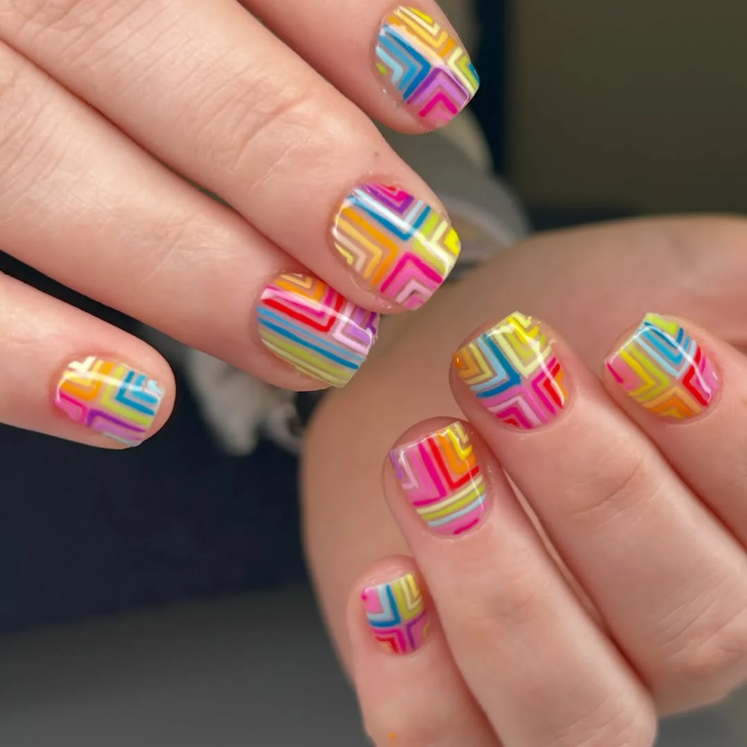 bright summer nails 2026 Rainbow Geometric Lines for Maximum Color Lovers